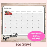 Calendar for September with a red truck design, glasses, and a pink label on a wooden surface.