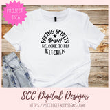 White t-shirt with black text on a wooden surface, featuring 'SCC Digital Designs' branding.