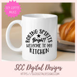 White mug with text 'Baking Spirits Bright! Welcome to my Kitchen' on a blurred background with a croissant.