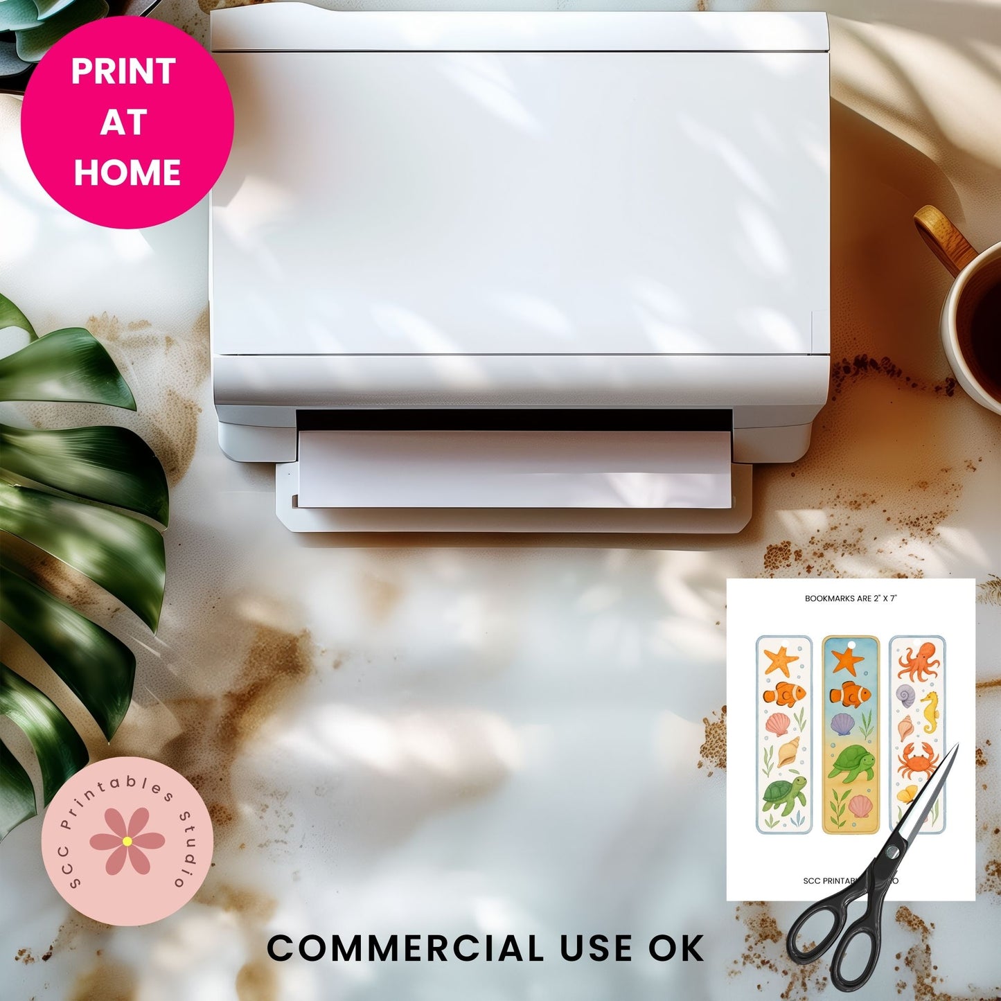 White printer on a marble surface with a sheet of printed stickers and scissors, featuring 'Print at Home' and 'Commercial Use OK' text.