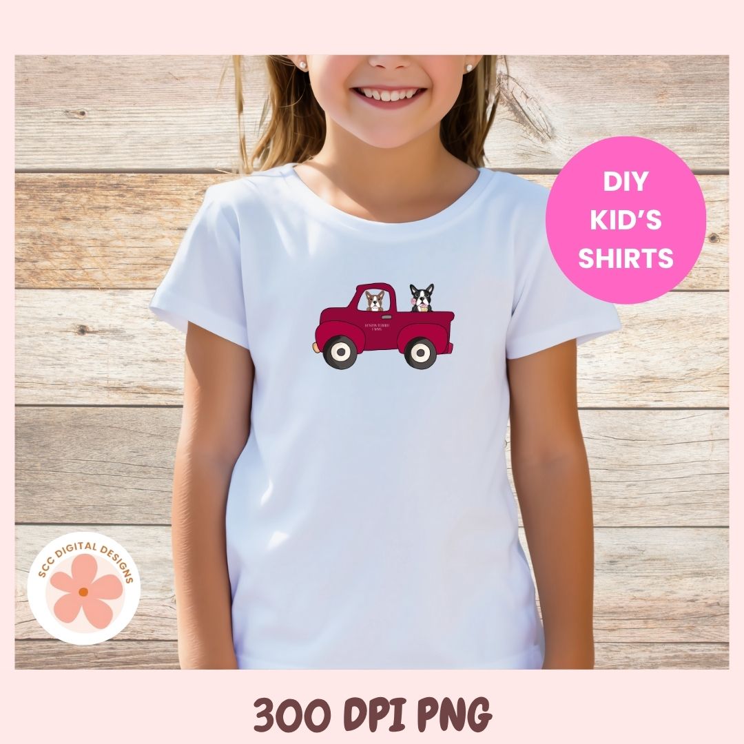 Child wearing a white t-shirt with a red truck graphic, standing against a wooden background.