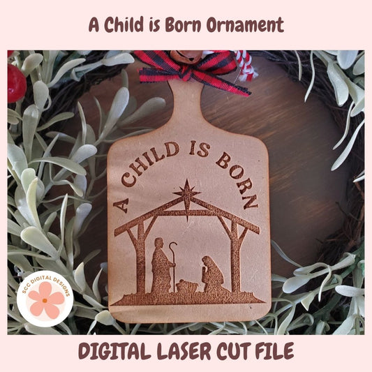 Decorative ornament with 'A Child is Born' text and nativity scene on a wreath background.