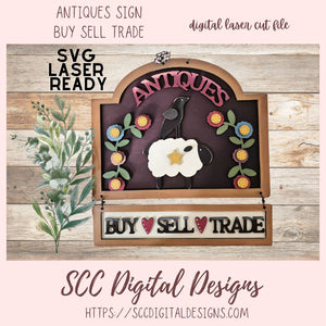 Digital laser cut file of an 'Antiques' sign with a sheep and crow design on a wooden background.