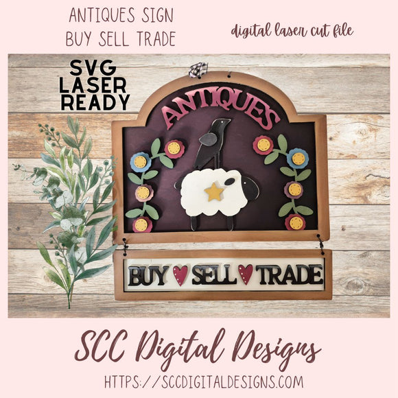 Digital laser cut file of an 'Antiques' sign with a sheep and crow design on a wooden background.