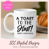 White mug with text 'A Toast to the Host! Merry Christmas!' on a blurred background with a croissant.