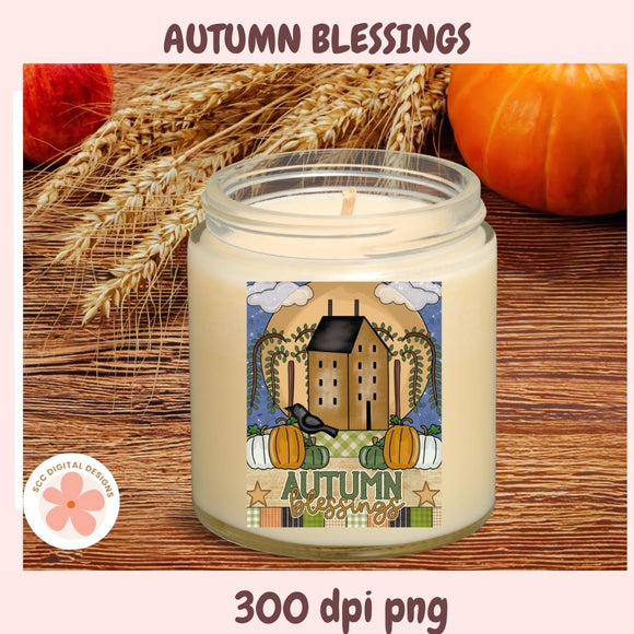 Candle with 'Autumn Blessings' label on a wooden surface with pumpkins and wheat.