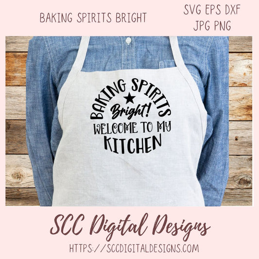 Apron with 'Baking Spirits Bright! Welcome to my Kitchen' text on a wooden background, featuring the brand 'SCC Digital Designs'.