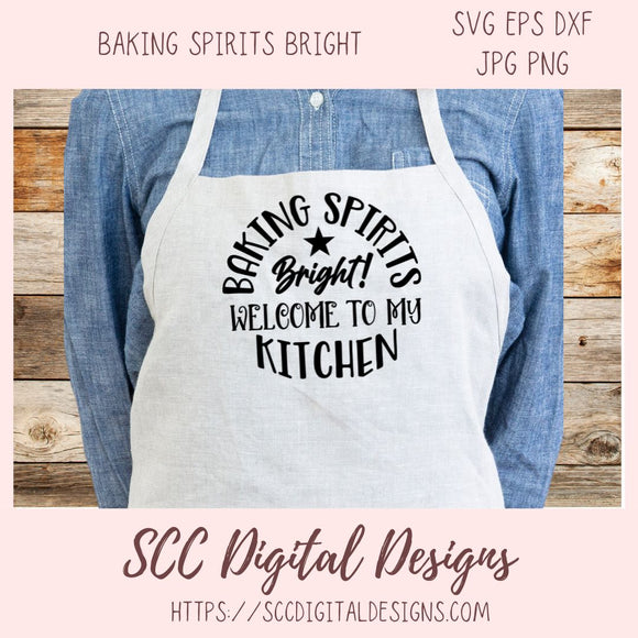 Apron with 'Baking Spirits Bright! Welcome to my Kitchen' text on a wooden background, featuring the brand 'SCC Digital Designs'.