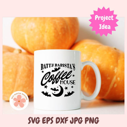 White mug with 'Batty Barista's Coffee House' text in front of pumpkins, with 'Project Idea' label.