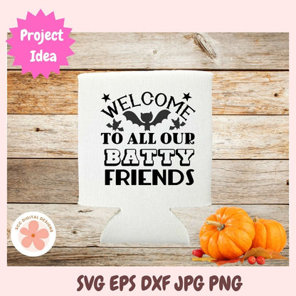 White can cooler with 'Welcome to all our batty friends' text on a wooden surface with pumpkins.