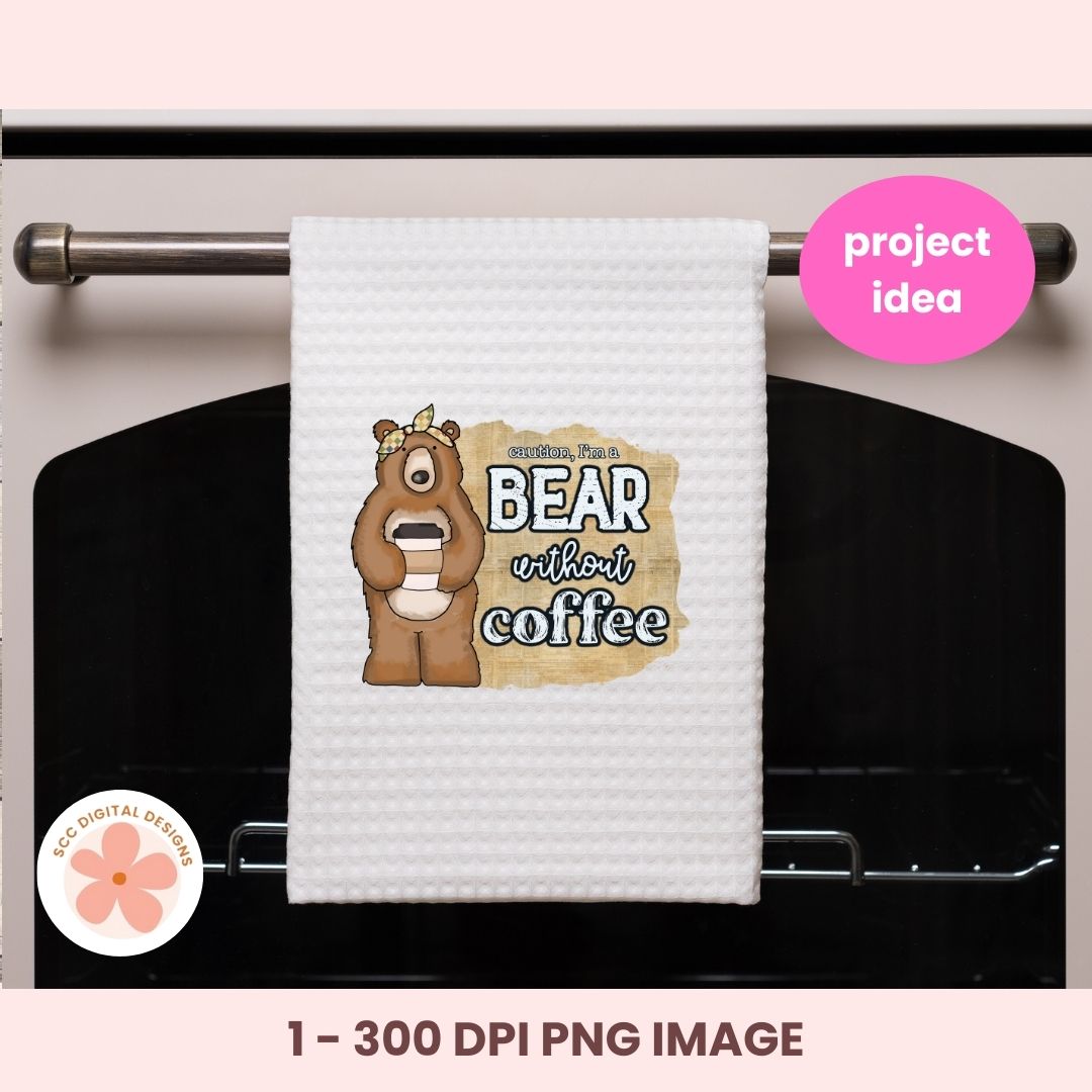 White towel with bear graphic and 'Bear without coffee' text hanging on a stove handle, with 'project idea' label.