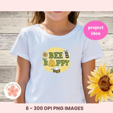 White t-shirt with 'BEE HAPPY' design on a wooden background