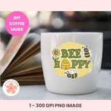 White mug with 'Bee Happy' design on a blurred background