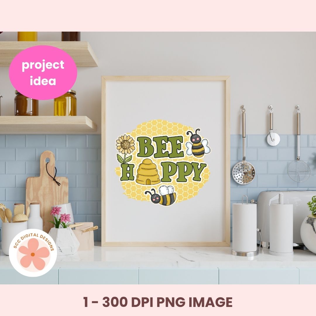 Framed 'Bee Happy' artwork on a kitchen counter with a pink 'project idea' label.