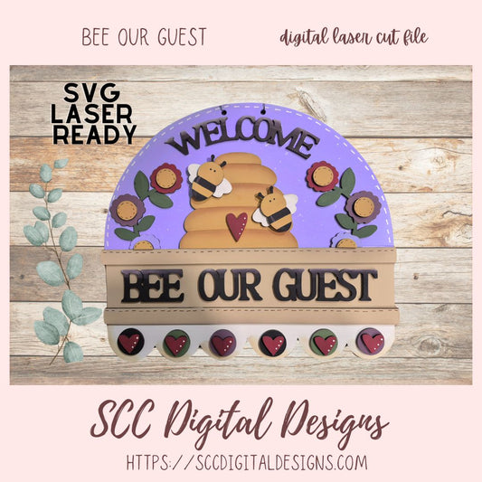 Decorative sign with bees and flowers on a wooden background, featuring text 'Bee our Guest' and 'Welcome'.