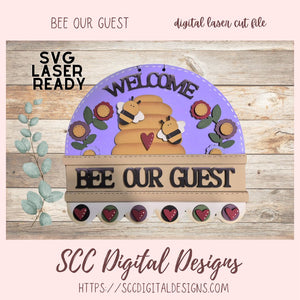 Decorative sign with bees and flowers on a wooden background, featuring text 'Bee our Guest' and 'Welcome'.
