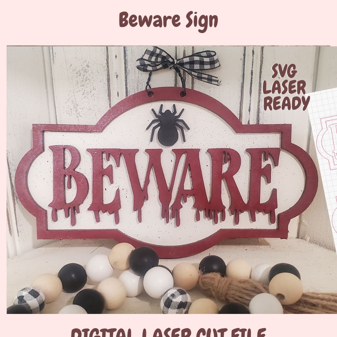 A Halloween-style decorative sign with the word 'BEWARE' in dripping red letters on a white background, topped with a black spider and a black-and-white gingham bow. The sign is shown with bead garland and rustic props, with text reading 'Beware Sign,' 'SVG LASER READY,' and 'DIGITAL LASER CUT FILE.