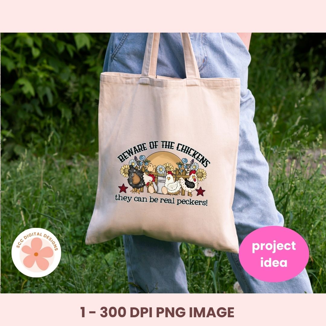 Tote bag with a humorous chicken design held by a person outdoors