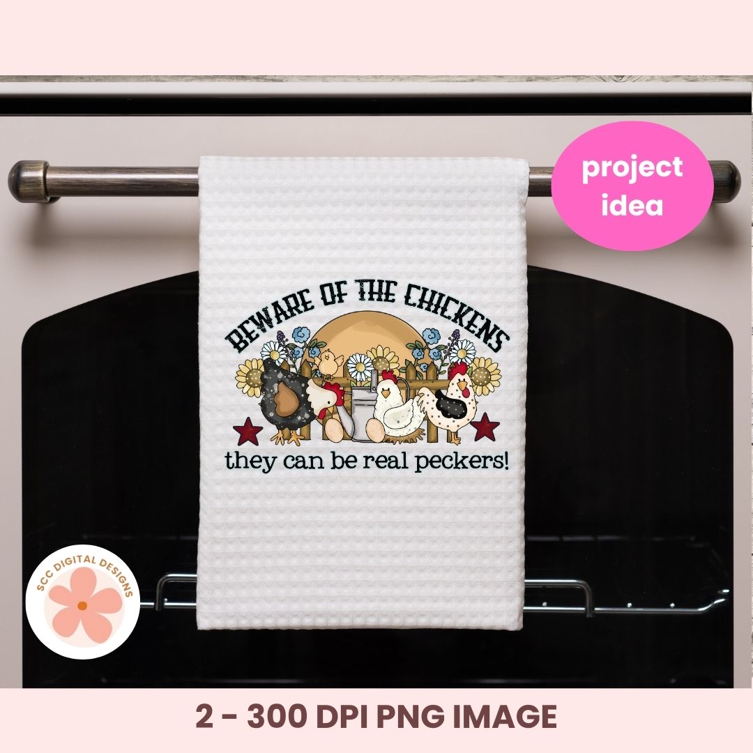 White towel with chicken design and text hanging on a oven rack, with 'project idea' label.