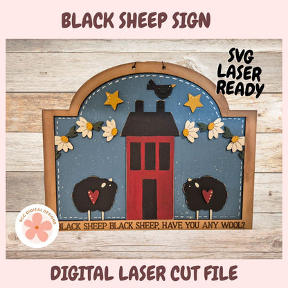 Decorative sign with black sheep, red barn, and text on a wooden background