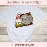 White t-shirt with a gnomes and camping design on a wooden surface