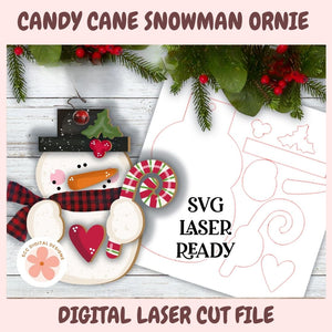 Candy Cane Snowman Ornament with SVG Laser Ready text and digital laser cut file on a wooden surface.