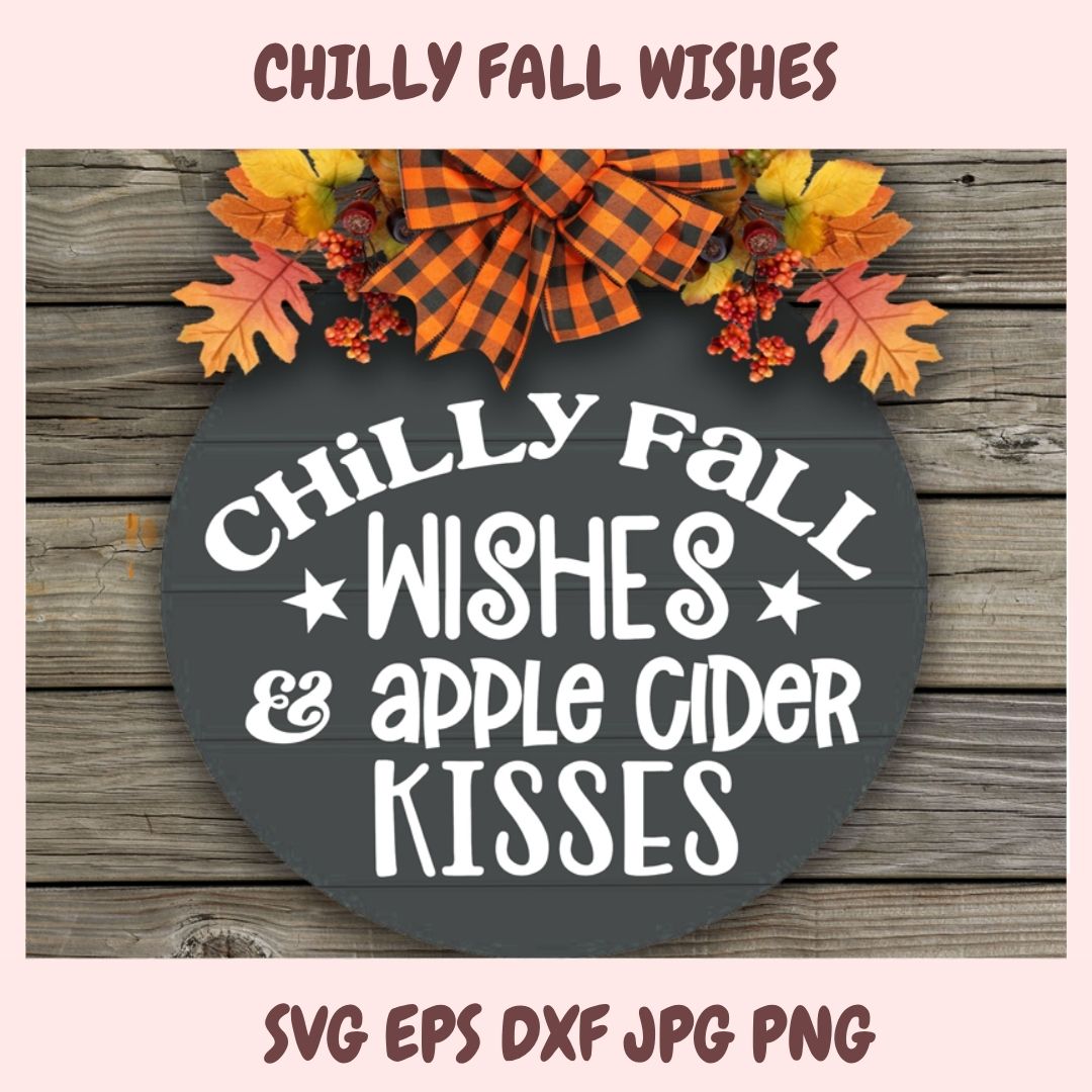 Decorative sign with 'Chilly Fall Wishes & Apple Cider Kisses' text on a wooden background with fall leaves and a plaid bow.