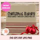 Christmas bakery sign with red ornaments on a wooden background