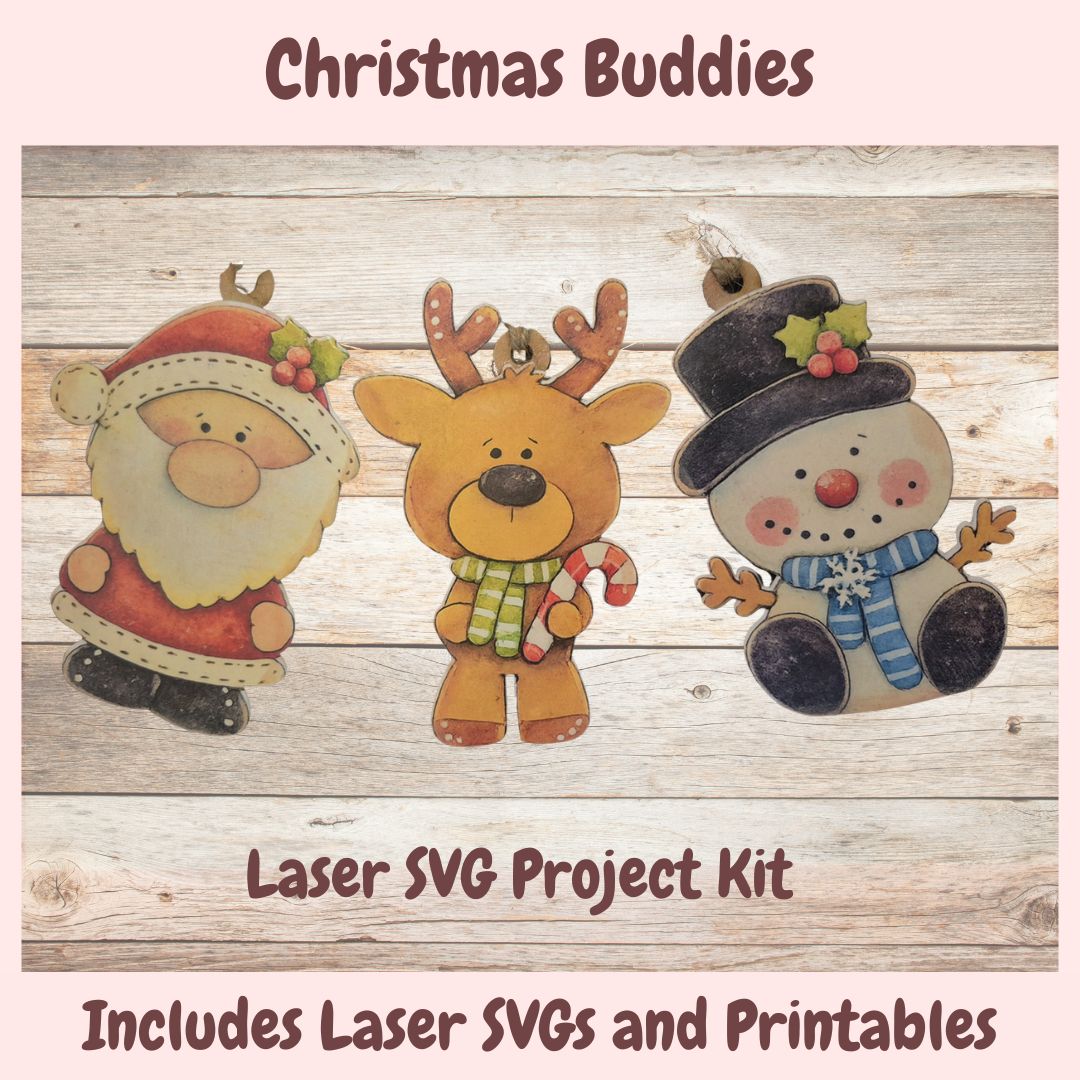 Promotional graphic for a Christmas-themed laser SVG project kit, featuring three festive cutout figures: Santa Claus, a reindeer, and a snowman, arranged on a rustic wood background with text reading 'Christmas Buddies,' 'Laser SVG Project Kit,' and 'Includes Laser SVGs and Printables.'.