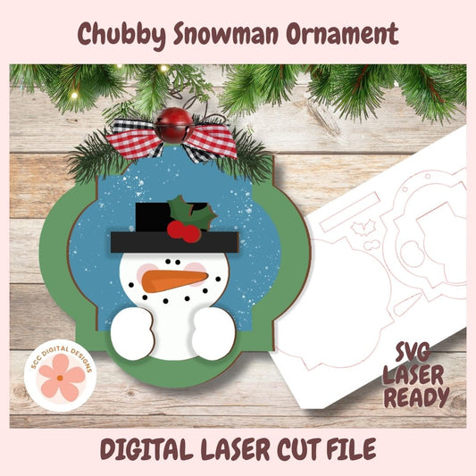 Digital preview for a Chubby Snowman ornament laser cut file, showing a festive snowman design with a blue winter background, green scalloped frame, red bow, pine branches, and a white template sheet on a wood-plank background.