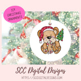 Circular Christmas ornament with a teddy bear holding a gingerbread man, surrounded by festive decorations, with 'SCC Digital Designs' branding.