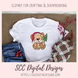 White t-shirt with a teddy bear design featuring a Santa hat and candy cane, surrounded by Christmas decor on a brown surface.