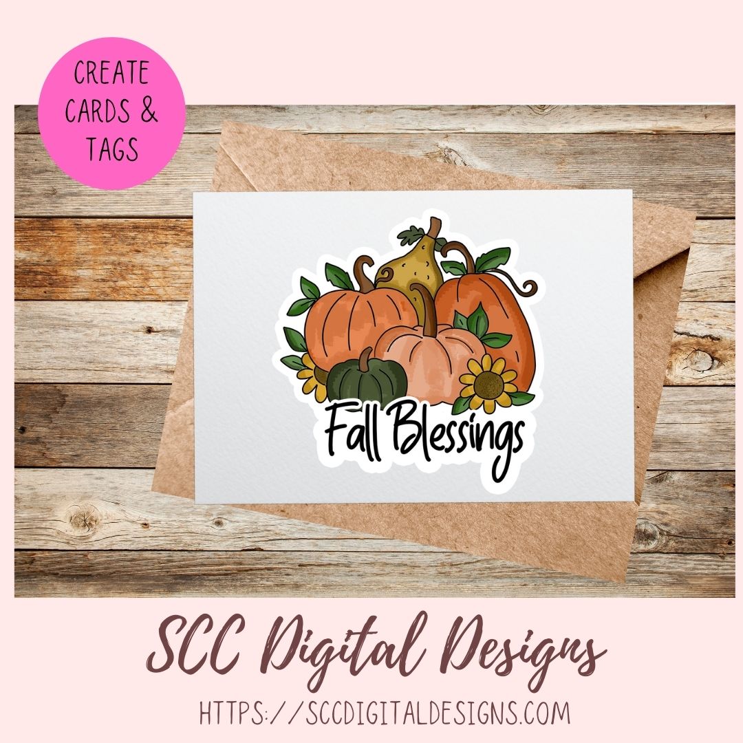 A white greeting card with an autumn illustration of pumpkins, a pear, sunflowers, and the words 'Fall Blessings,' shown with a kraft envelope on a rustic wood background. A pink circle says 'Create Cards & Tags,' and 'SCC Digital Designs' appears at the bottom.