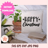 Decorative pillow with 'Happy Christmas' text on a cozy setting with plants and books.