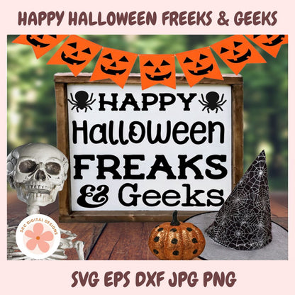 Halloween-themed digital sign design reading 'Happy Halloween Freaks & Geeks' in black text on a white background with a rustic wood frame. The sign is styled with orange jack-o'-lantern banner flags, a white skull, a small orange pumpkin, and a black spider hat on a wooden surface with a blurred green outdoor background.