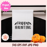 White towel with 'Happy Haunting' text on a rack with pumpkins below, featuring a 'Project Idea' label.