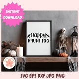 Framed 'Happy Haunting' sign on a Halloween-themed shelf with pumpkins and a skeleton.