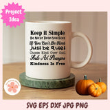 Mug with motivational quote on a wooden surface with pumpkins, featuring 'Project Idea' text.