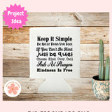 Motivational quote card on a wooden surface with a cactus plant.