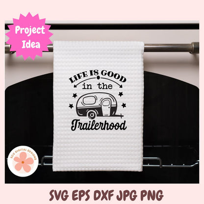 White towel with 'Life is good in the trailerhood' text and graphic on a rack, with 'Project Idea' label.