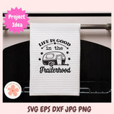 White towel with 'Life is good in the trailerhood' text and graphic on a rack, with 'Project Idea' label.