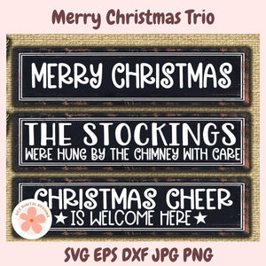 Three wooden sign panels with Christmas-themed text on a textured background.