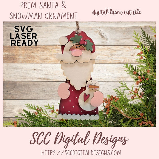 Digital laser cut file of a Santa Claus and snowman ornament with greenery on a wooden background