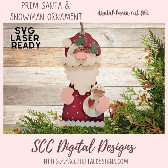 Digital laser cut file of a Santa Claus and snowman ornament with greenery on a wooden background