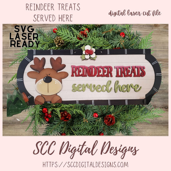 Decorative sign with reindeer design and text 'Reindeer treats served here' surrounded by Christmas decorations.