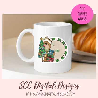 A white ceramic coffee mug with a custom holiday bear design, shown on a light beige surface with a blurred croissant in the background. The design features a brown teddy bear wearing a Santa hat next to a green and white striped oval frame with placeholder text.
