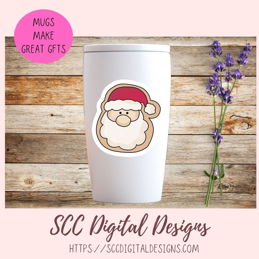 White tumbler with Santa Claus design on a wooden background with lavender.