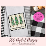 Decorative towel with Christmas tree design and checkered patterns in the background, featuring SCC Digital Designs branding.
