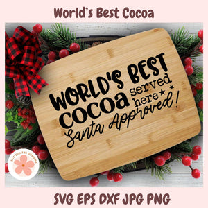 Wooden sign with 'World's Best Cocoa' text surrounded by Christmas decorations