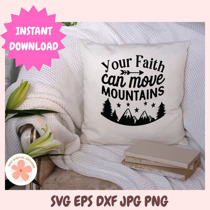 Decorative pillow with 'your faith can move mountains' text on a white surface with flowers and books.